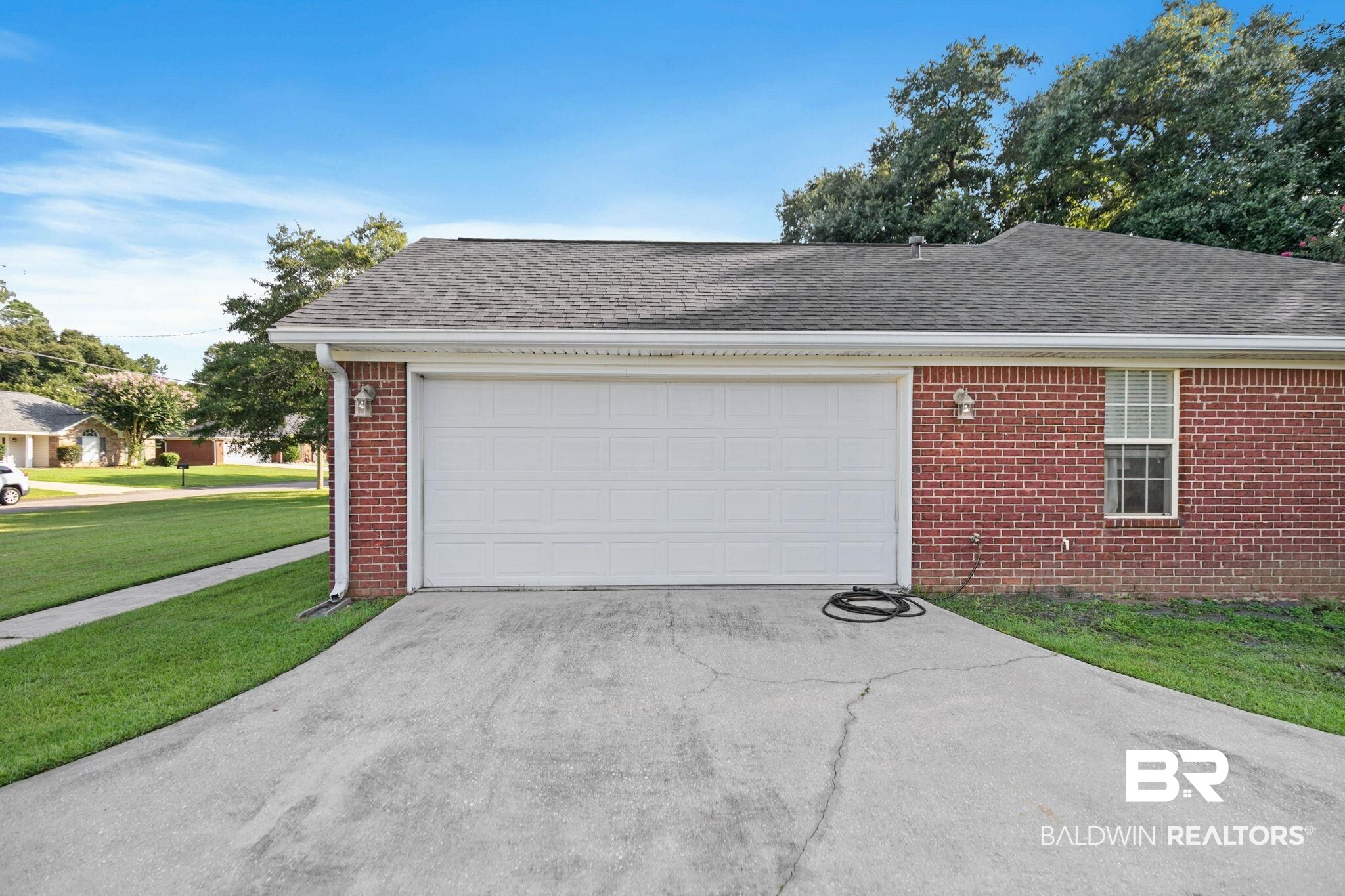 10550 Patrick Avenue Grand Bay, AL 36541 - Photo 7 of 43 Garage featuring a yard
