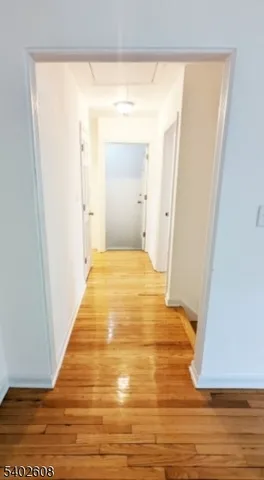 a view of bathroom with wooden floor