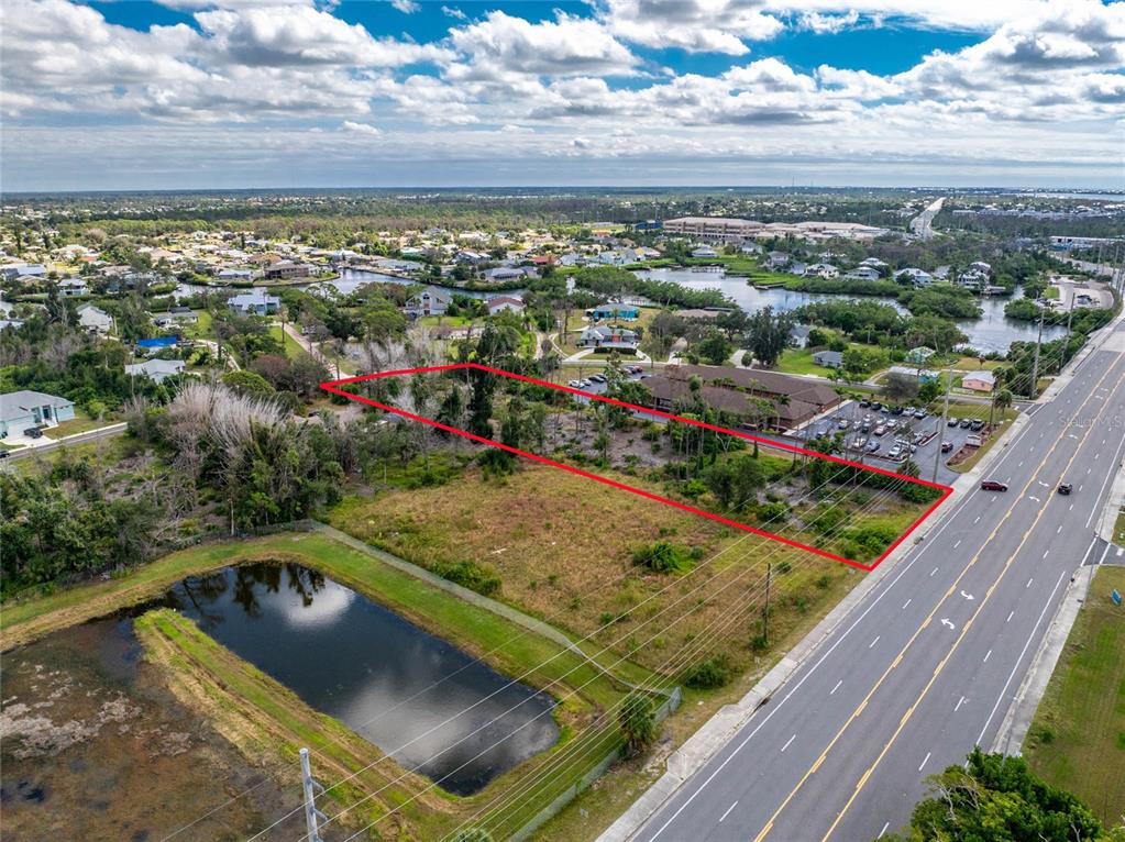 1781 Placida Road Englewood, FL 34223 - Photo 12 of 16 a view of a lake from a balcony