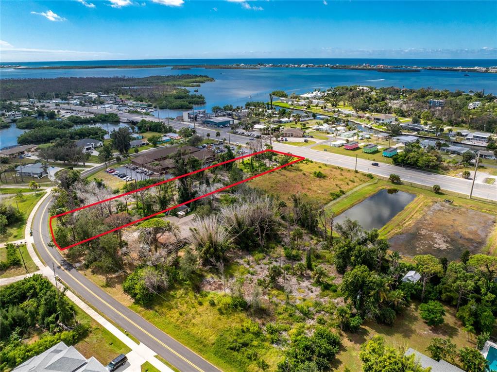 1781 Placida Road Englewood, FL 34223 - Photo 9 of 16 a view of a yard with wooden floor