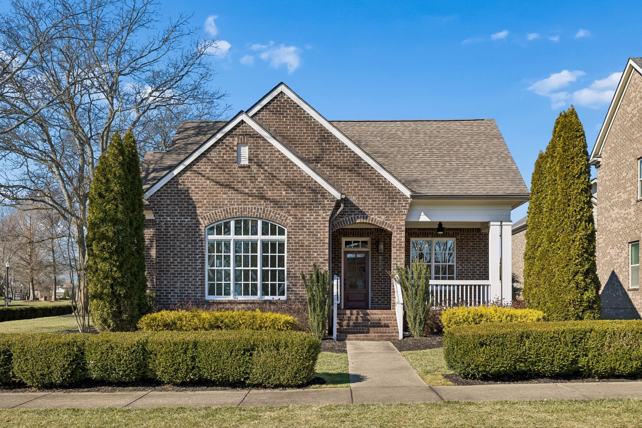 2525 Upper Hollow Road Thompson's Station, TN 37179 - Photo 1 of 79 a front view of a house with a garden