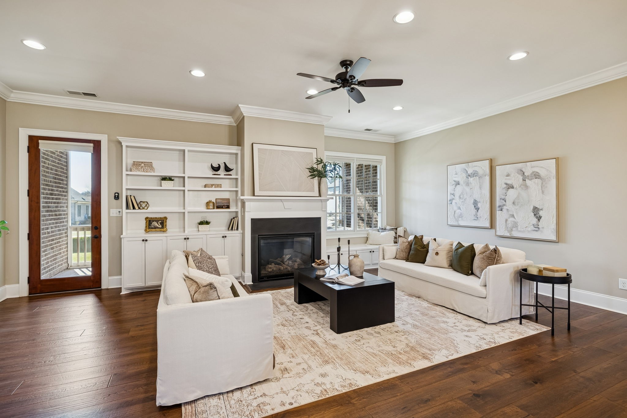 2525 Upper Hollow Road Thompson's Station, TN 37179 - Photo 26 of 79 a living room with furniture and a fireplace