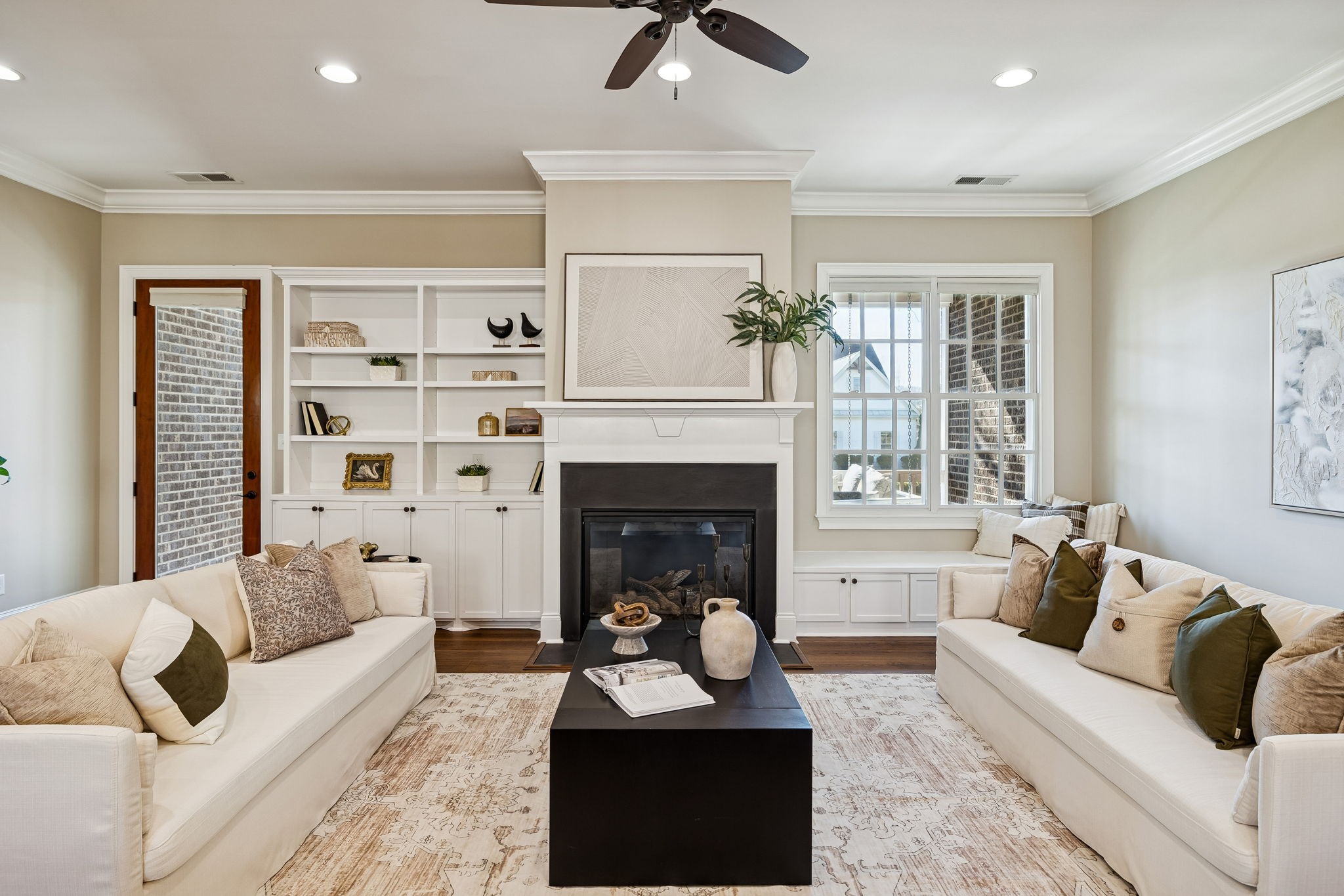 2525 Upper Hollow Road Thompson's Station, TN 37179 - Photo 34 of 79 a living room with furniture and a fireplace