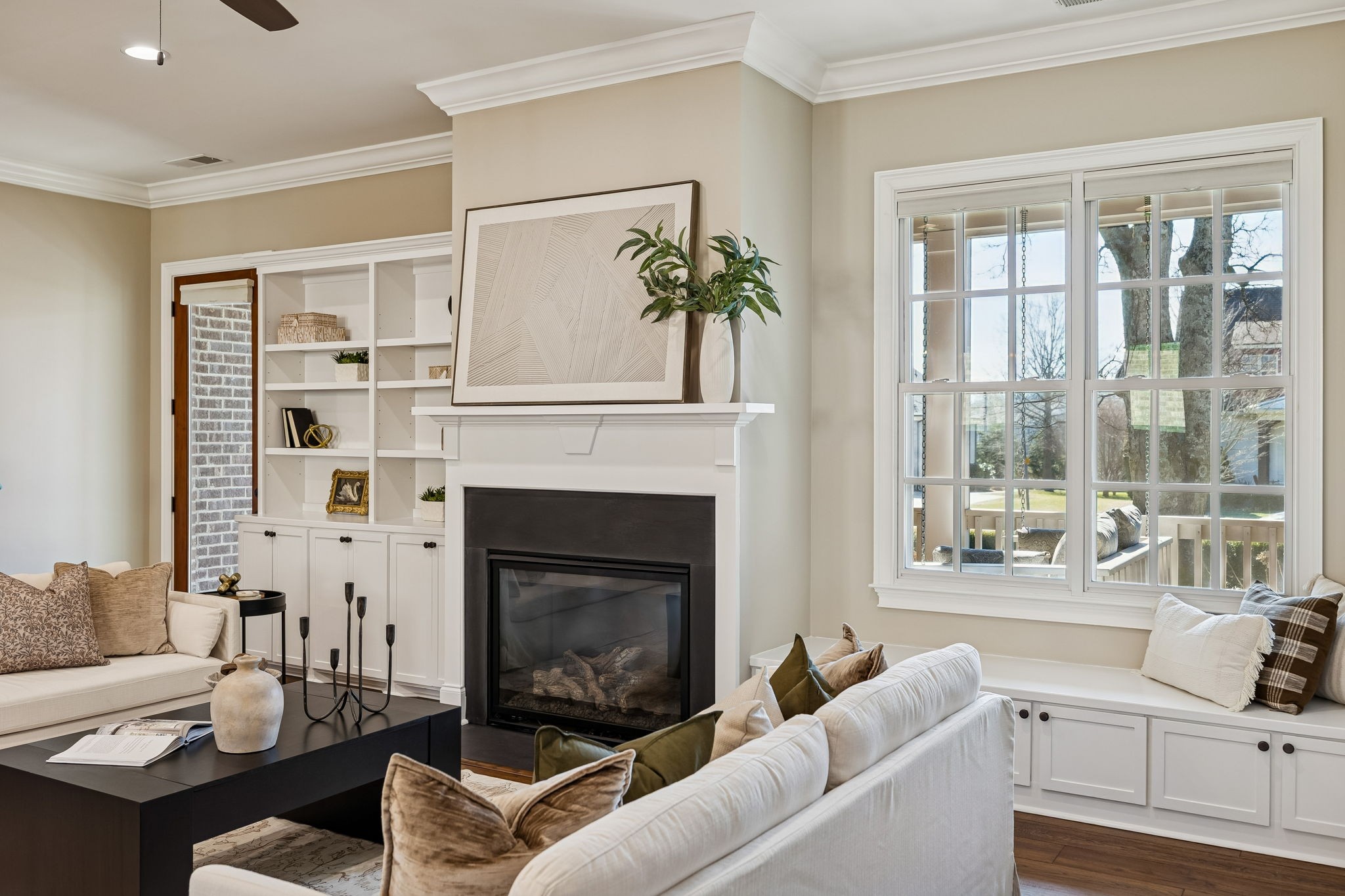 2525 Upper Hollow Road Thompson's Station, TN 37179 - Photo 36 of 79 a living room with furniture a window and a fireplace