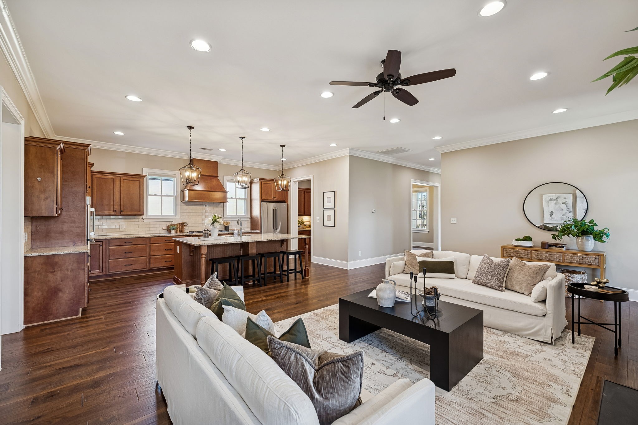 2525 Upper Hollow Road Thompson's Station, TN 37179 - Photo 37 of 79 a living room with furniture and a wooden floor