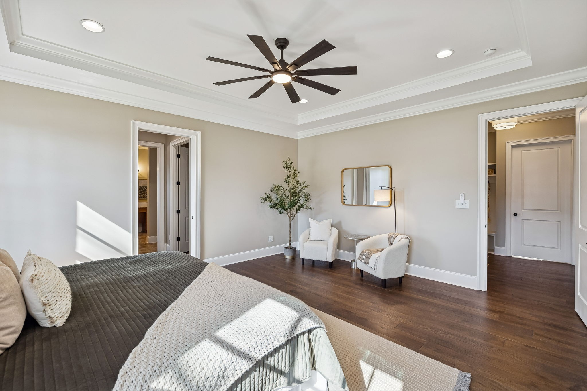 2525 Upper Hollow Road Thompson's Station, TN 37179 - Photo 56 of 79 a living room with couches and a dining table with wooden floor