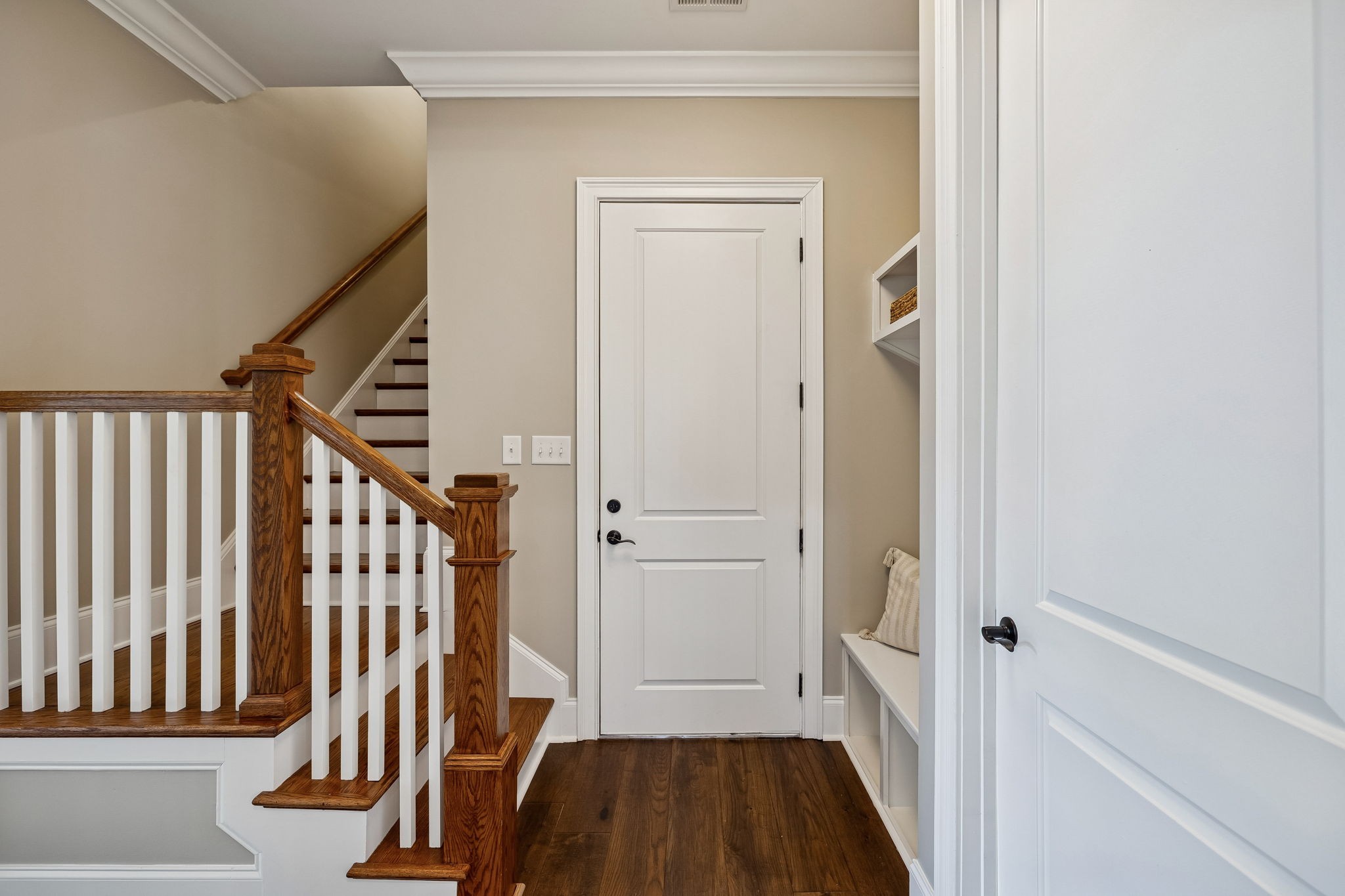 2525 Upper Hollow Road Thompson's Station, TN 37179 - Photo 67 of 79 a view of a hallway with wooden floor and staircase