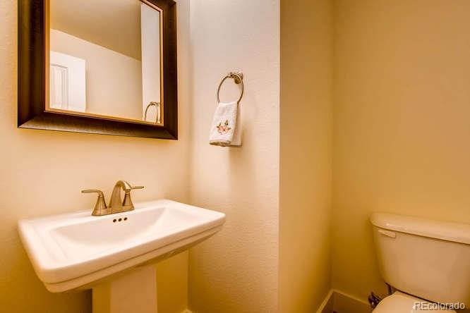 810 East Baseline Road, Unit B Lafayette, CO 80026 - Photo 15 of 28 a bathroom with a sink and a mirror