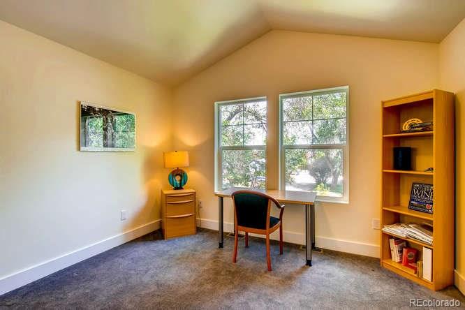 810 East Baseline Road, Unit B Lafayette, CO 80026 - Photo 23 of 28 a view of a workspace with furniture and a window