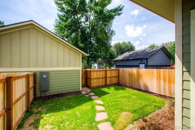 810 East Baseline Road, Unit B Lafayette, CO 80026 - Photo 26 of 28 a view of a backyard with a garden