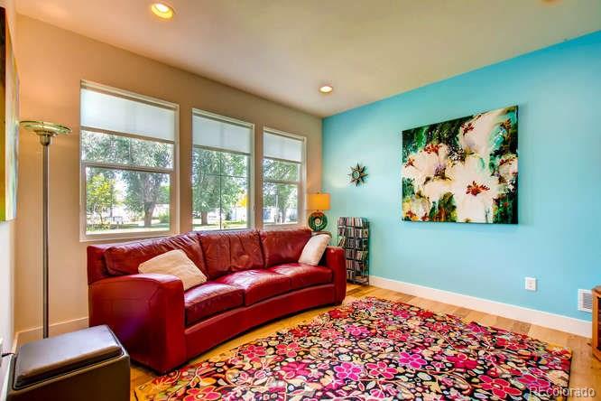 810 East Baseline Road, Unit B Lafayette, CO 80026 - Photo 6 of 28 a living room with furniture and a large window