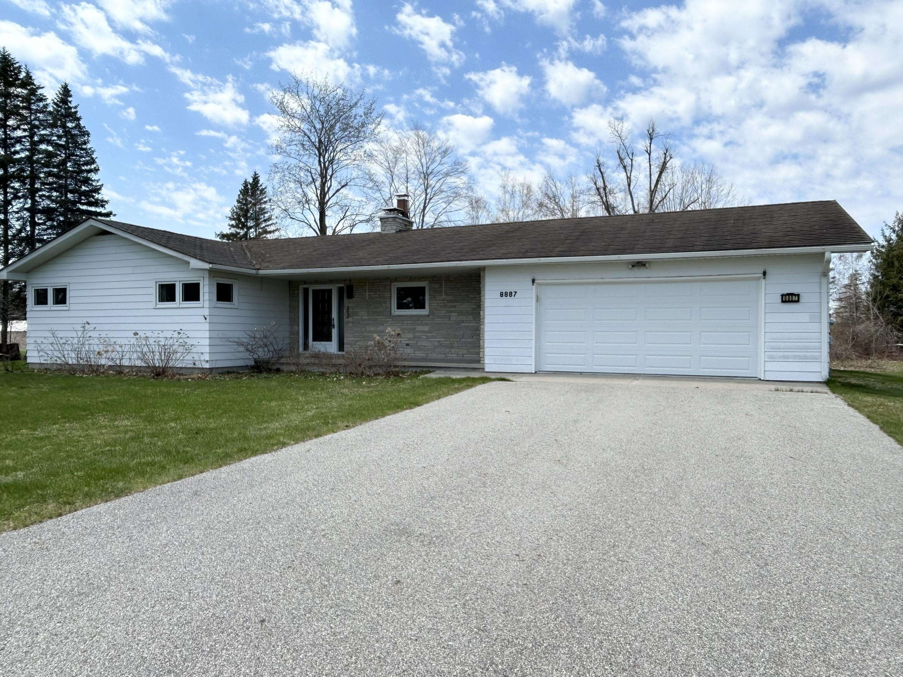 8887 Galbraith Road Cheboygan, MI 49721 - Photo 1 of 38 1 front