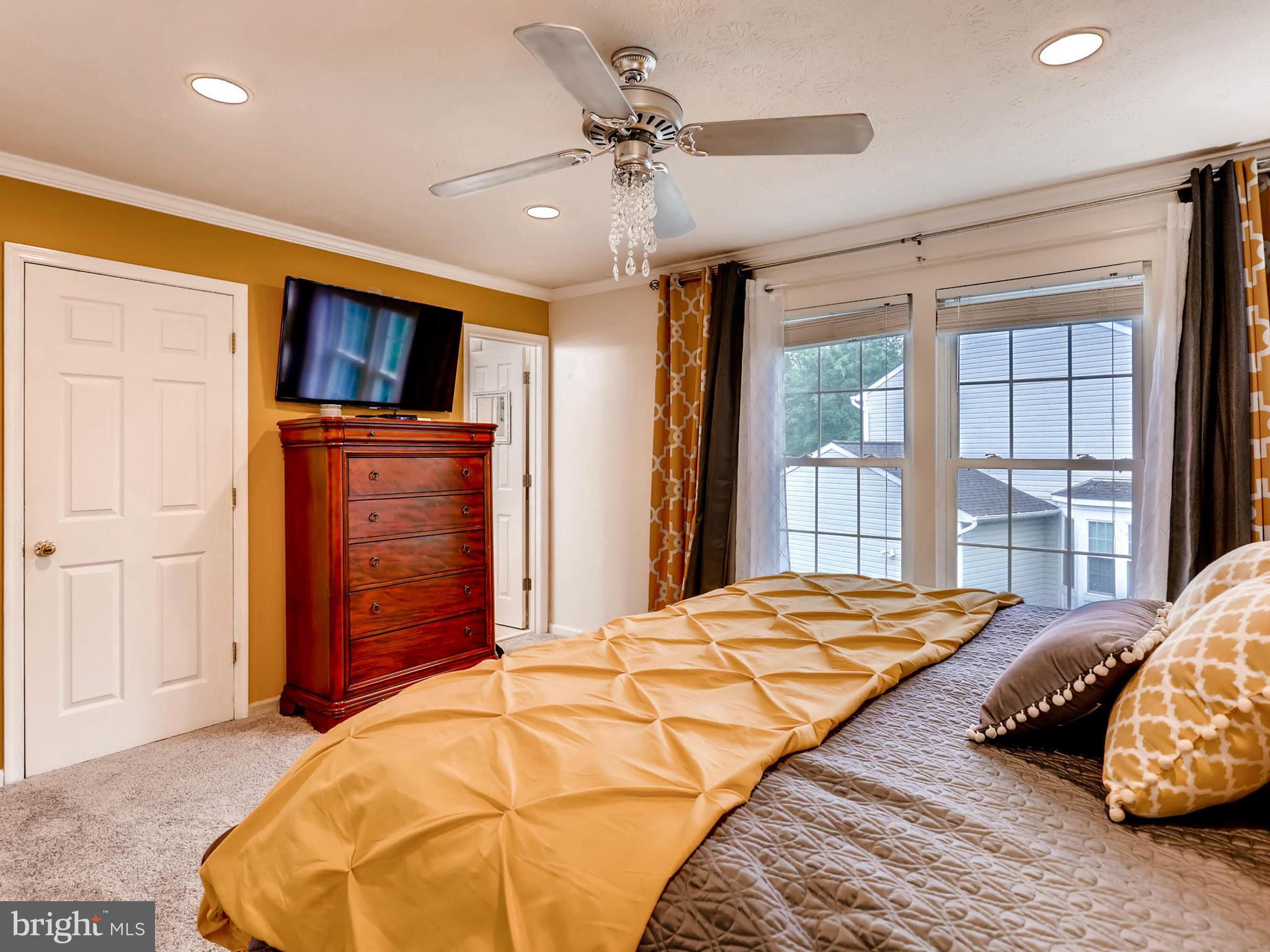 403 North Hammonds Ferry Road Linthicum, MD 21090 - Photo 15 of 30 a bedroom with a bed and a large window