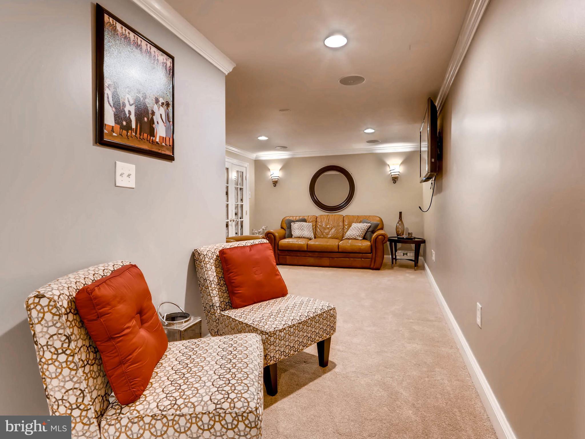 403 North Hammonds Ferry Road Linthicum, MD 21090 - Photo 26 of 30 a living room with furniture and a mirror