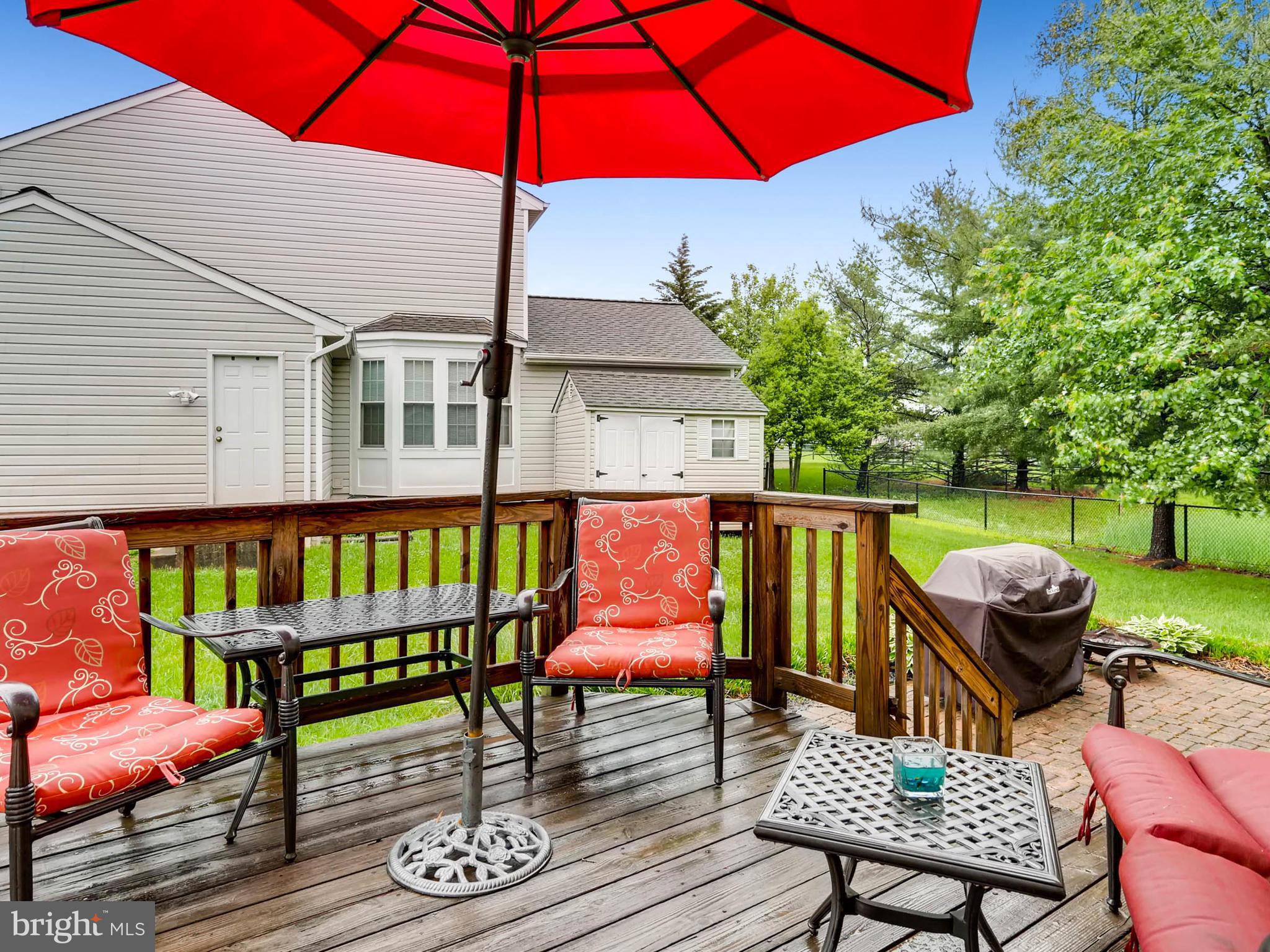403 North Hammonds Ferry Road Linthicum, MD 21090 - Photo 28 of 30 a view of a chairs and table in the patio