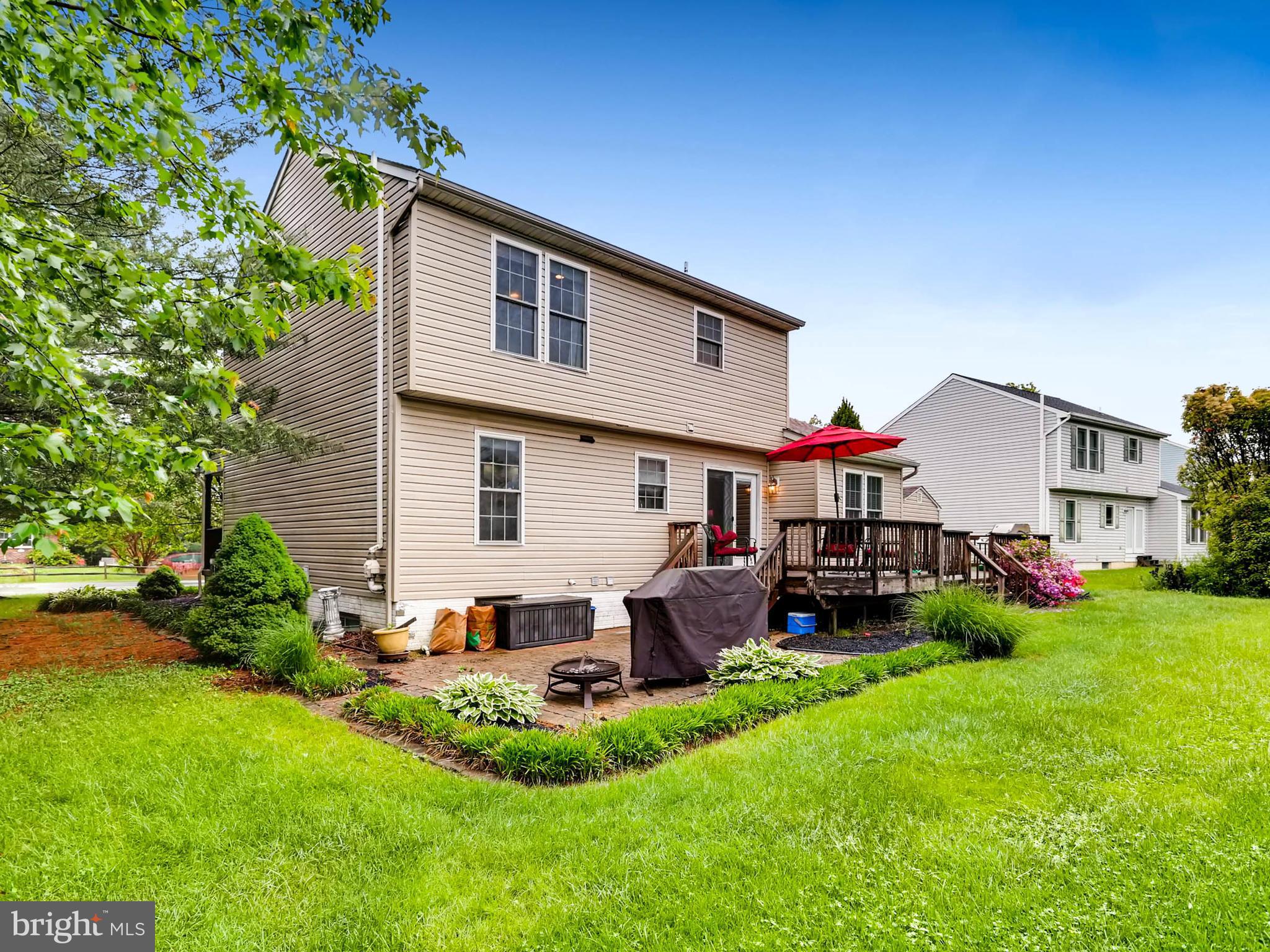 403 North Hammonds Ferry Road Linthicum, MD 21090 - Photo 29 of 30 a view of a house with a backyard and chairs