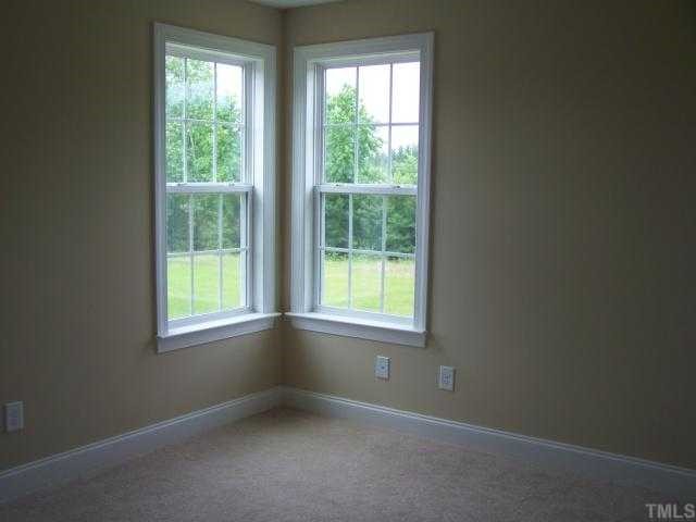 236 West Waycliff Road Henderson, NC 27537 - Photo 8 of 12 One of the second floor bedrooms has too windows at the corner - ideal for placing furniture