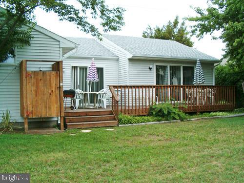 1402 Cedar Street Lewes, DE 19958 - Photo 6 of 6 a front view of a house with garden