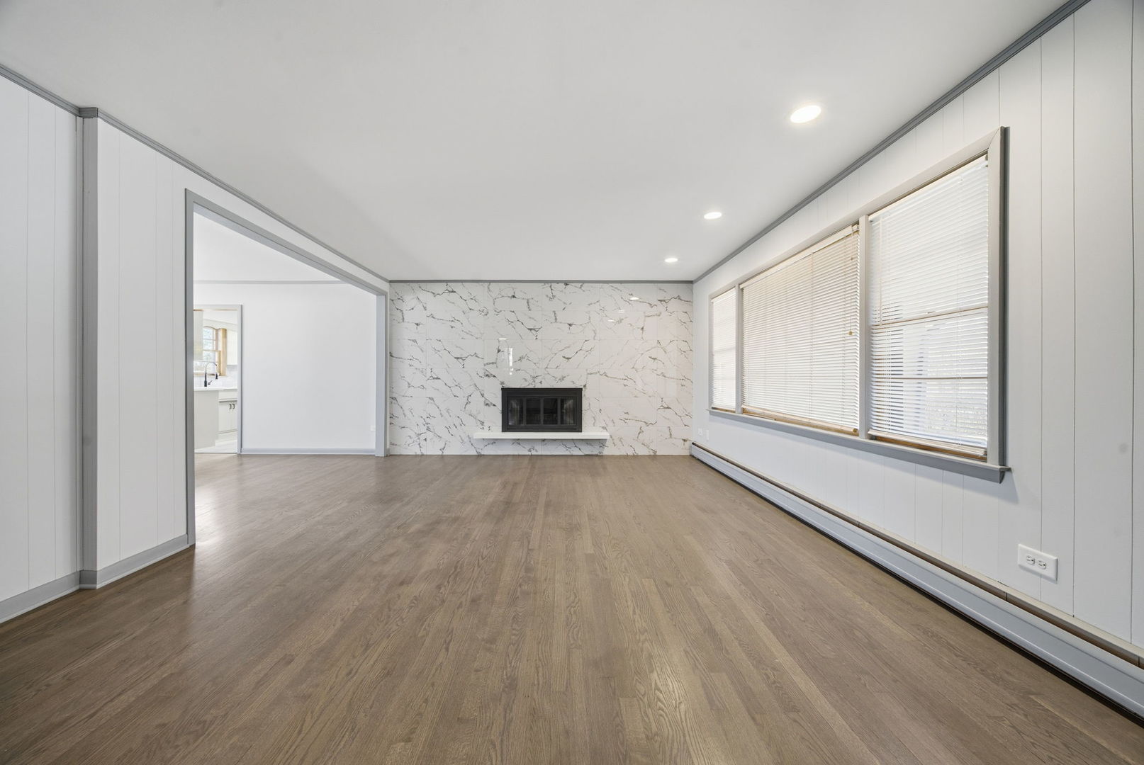 14601 Linder Avenue Midlothian, IL 60445 - Photo 3 of 21 wooden floor in an empty room with a window