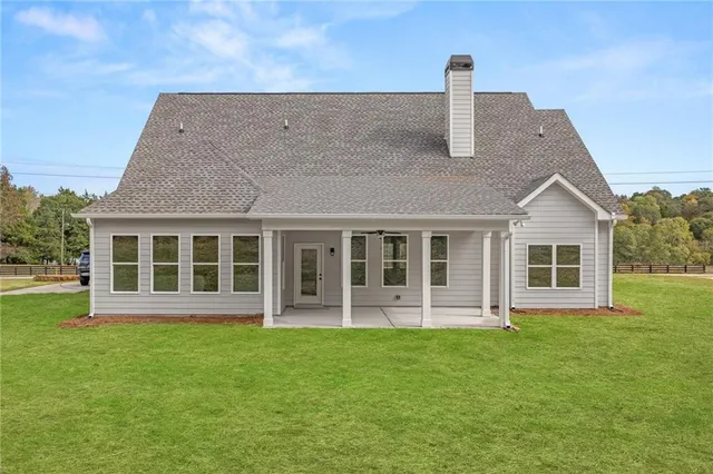 an aerial view of a golf course with parking space