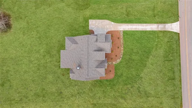 a view of swimming pool with a yard