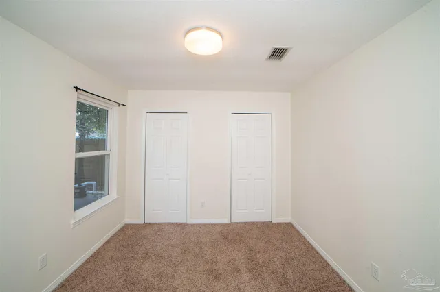 a view of a room with a window