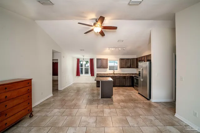 a kitchen with a cabinets and appliances