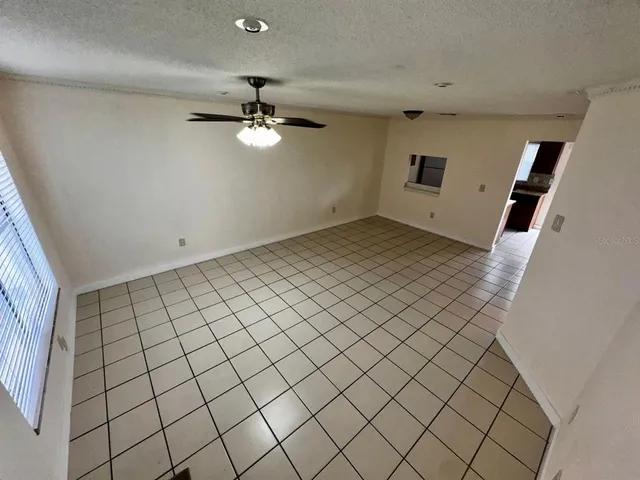 a view of a livingroom and entryway