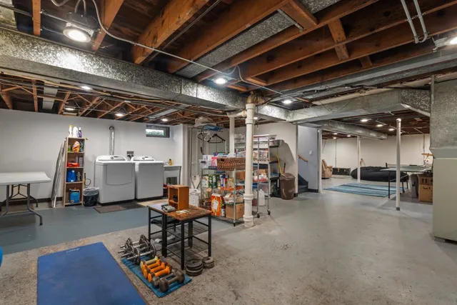 a view of a room with wooden furniture