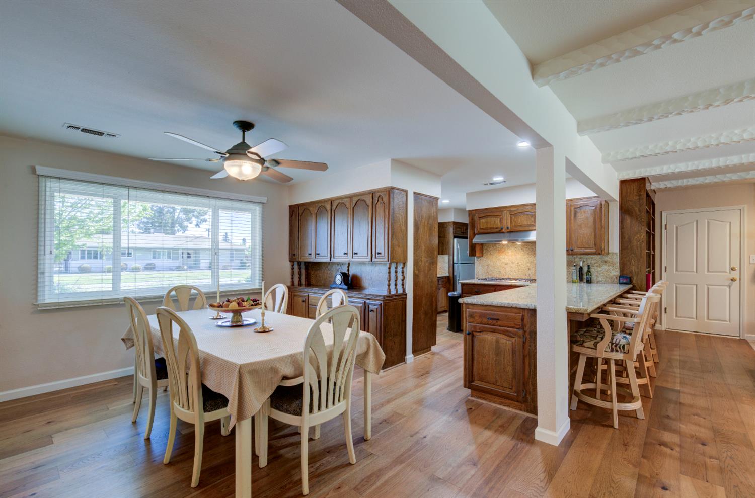 2004 South Renn Avenue Fresno, CA 93727 - Photo 7 of 33 Dining room opens to a modern kitchen.