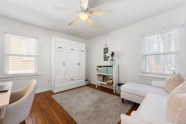 a bathroom with a sink a mirror and a shower