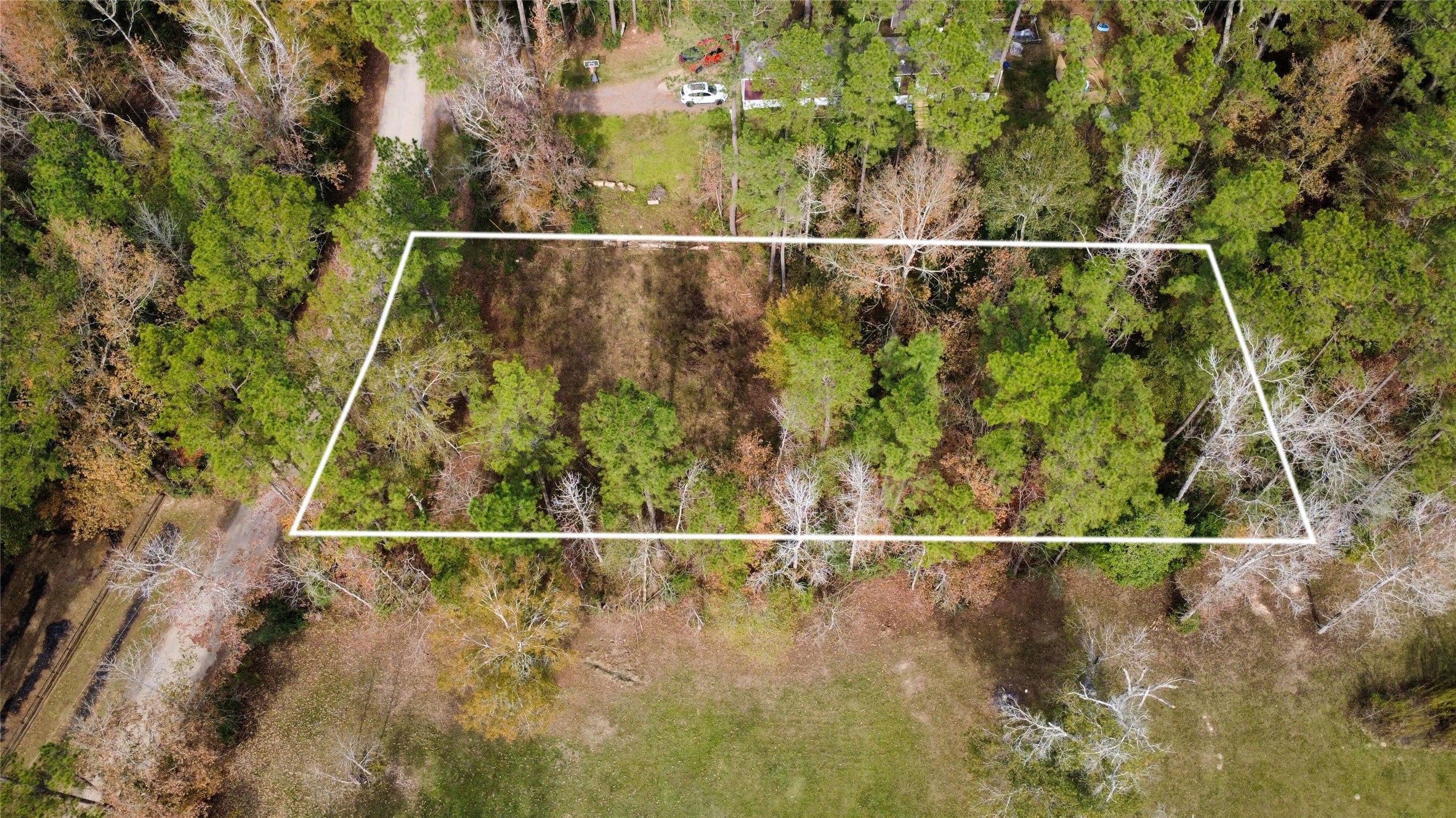 0 L L Denson Road Coldspring, TX 77331 - Photo 6 of 12 a view of fence