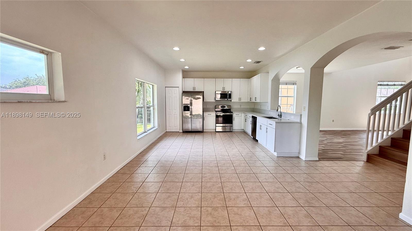13843 Southwest 31st Street Miramar, FL 33027 - Photo 13 of 58 a view of living room with furniture and window