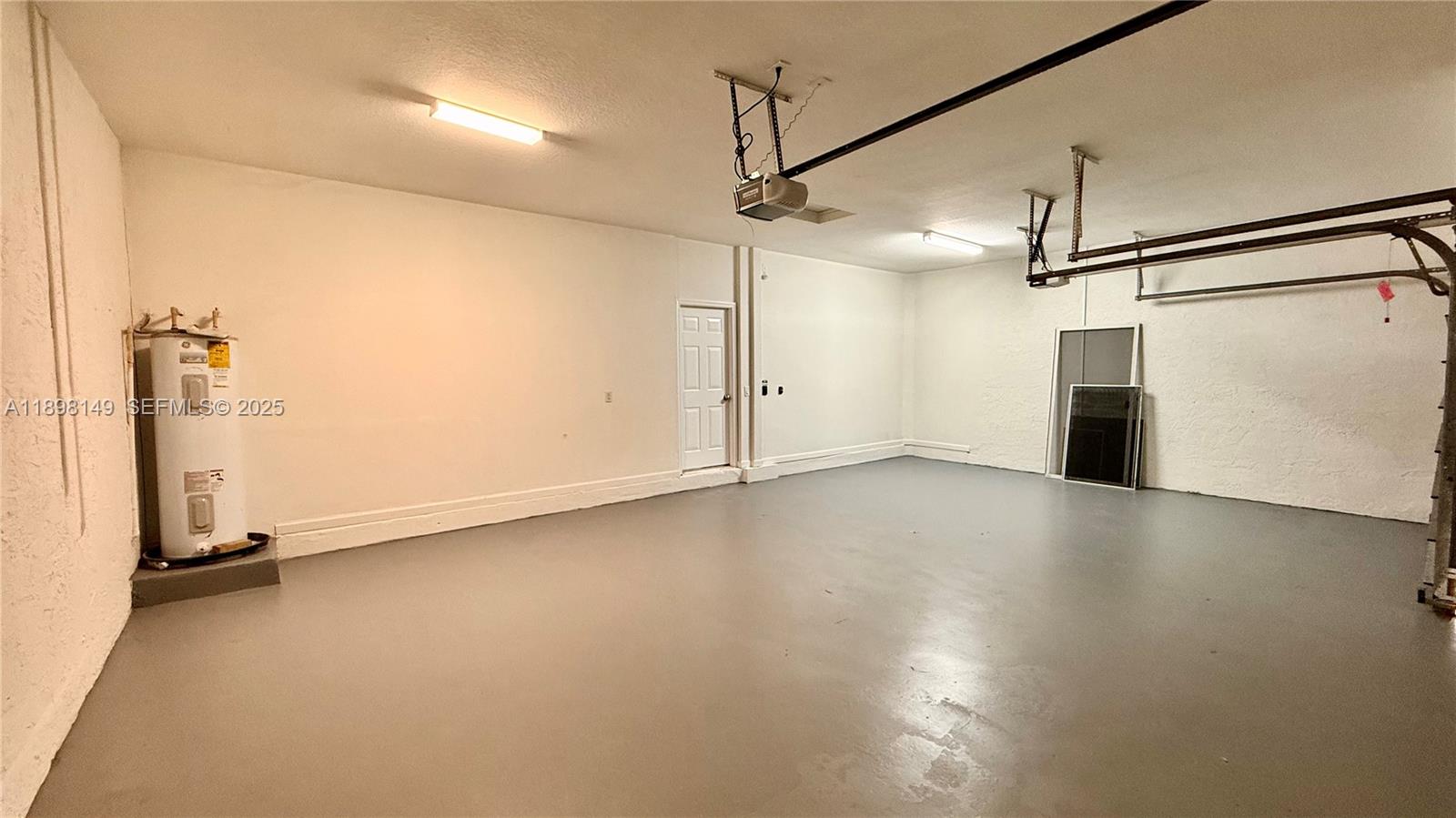 13843 Southwest 31st Street Miramar, FL 33027 - Photo 28 of 58 an empty room with a empty space and windows