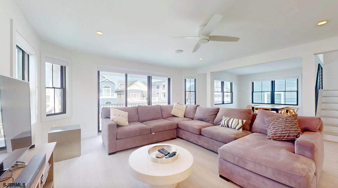 250 8th Street South Brigantine, NJ 08203 - Photo 11 of 33 a living room with furniture and a large window