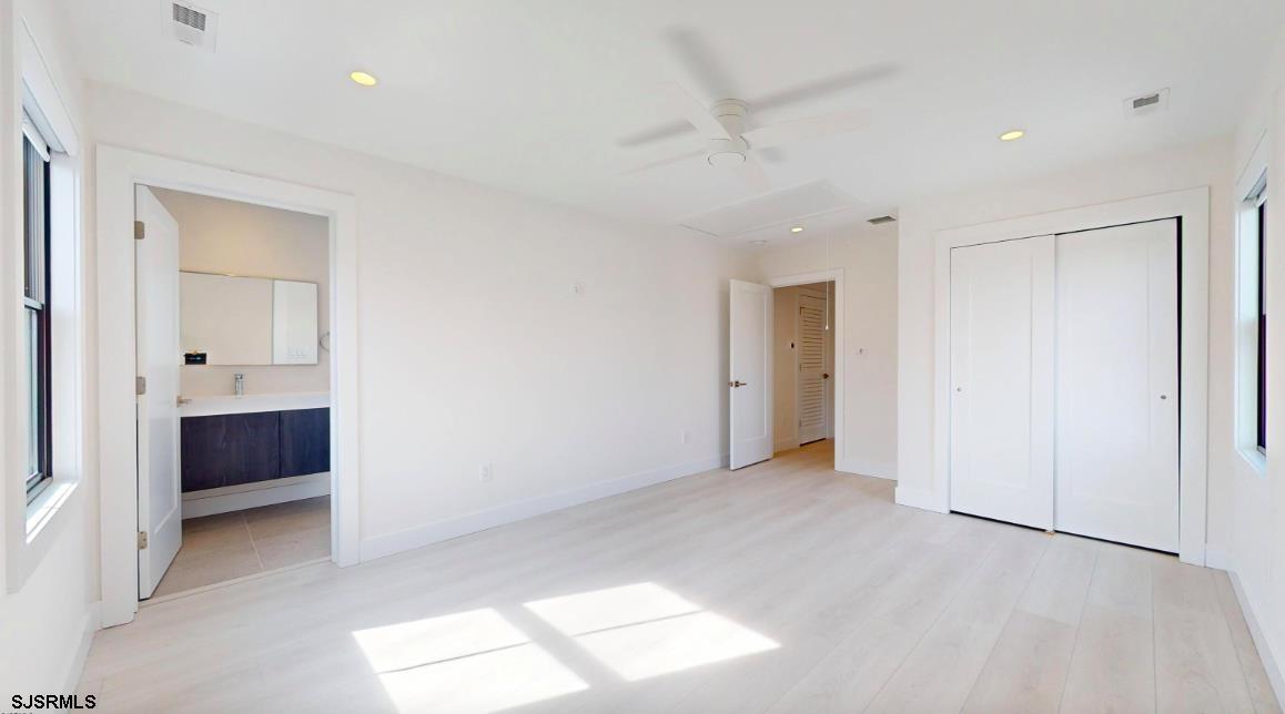 250 8th Street South Brigantine, NJ 08203 - Photo 16 of 33 a view of an empty room with a window