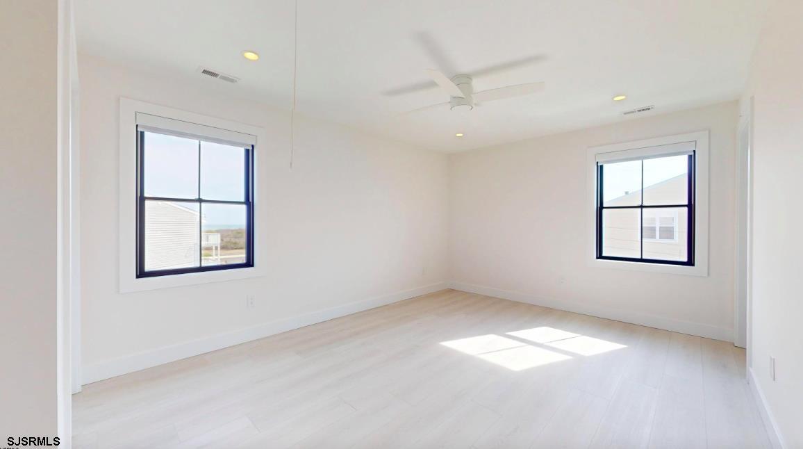 250 8th Street South Brigantine, NJ 08203 - Photo 17 of 33 an empty room with a window