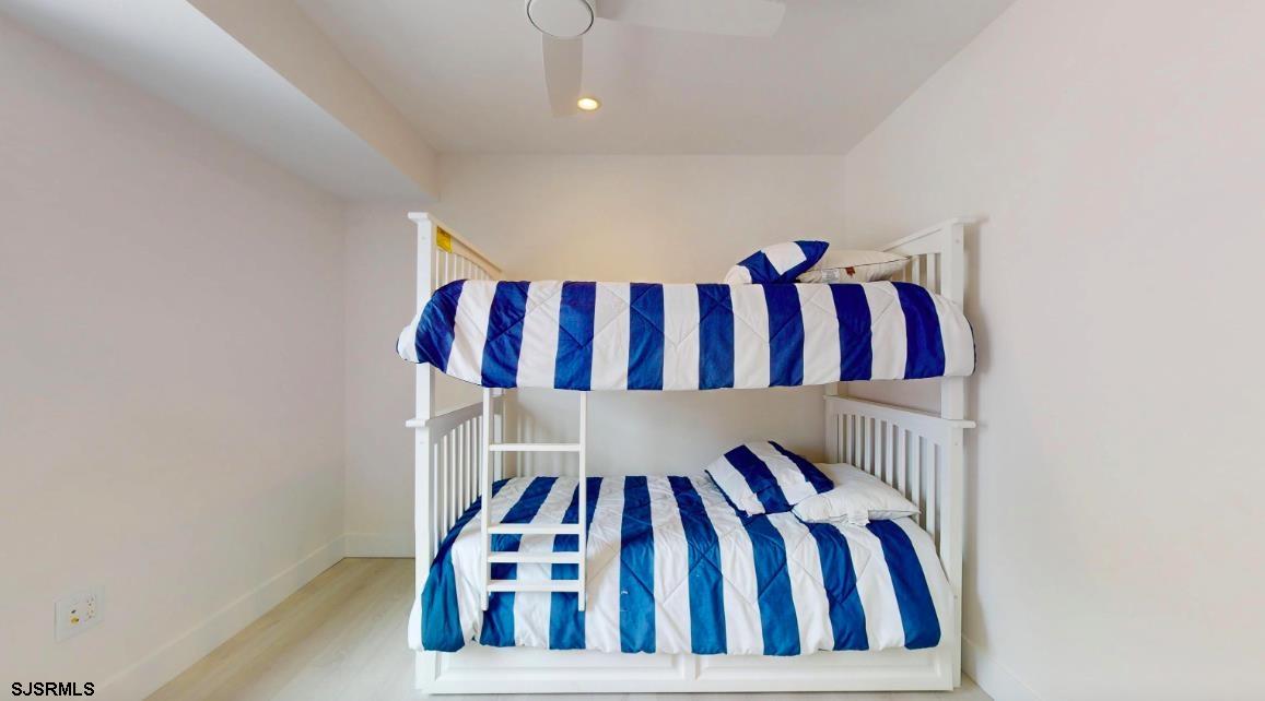 250 8th Street South Brigantine, NJ 08203 - Photo 25 of 33 a view of a bedroom with a bed