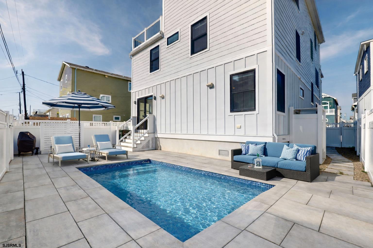 250 8th Street South Brigantine, NJ 08203 - Photo 32 of 33 a living room with furniture