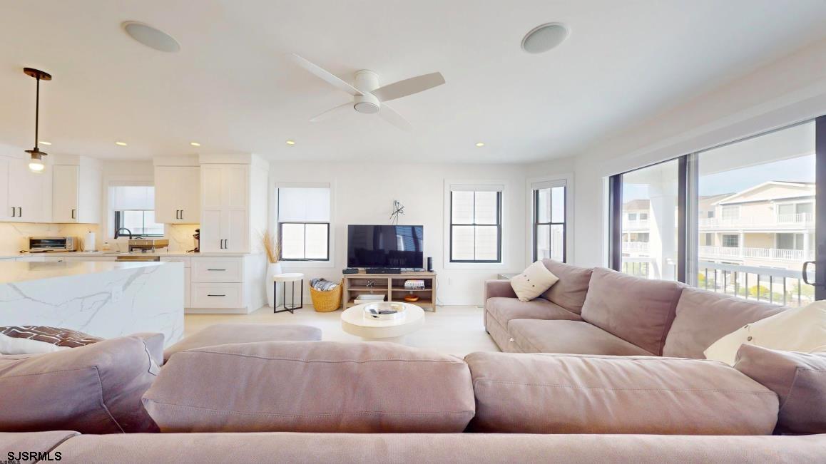 250 8th Street South Brigantine, NJ 08203 - Photo 9 of 33 a living room with furniture and a large window