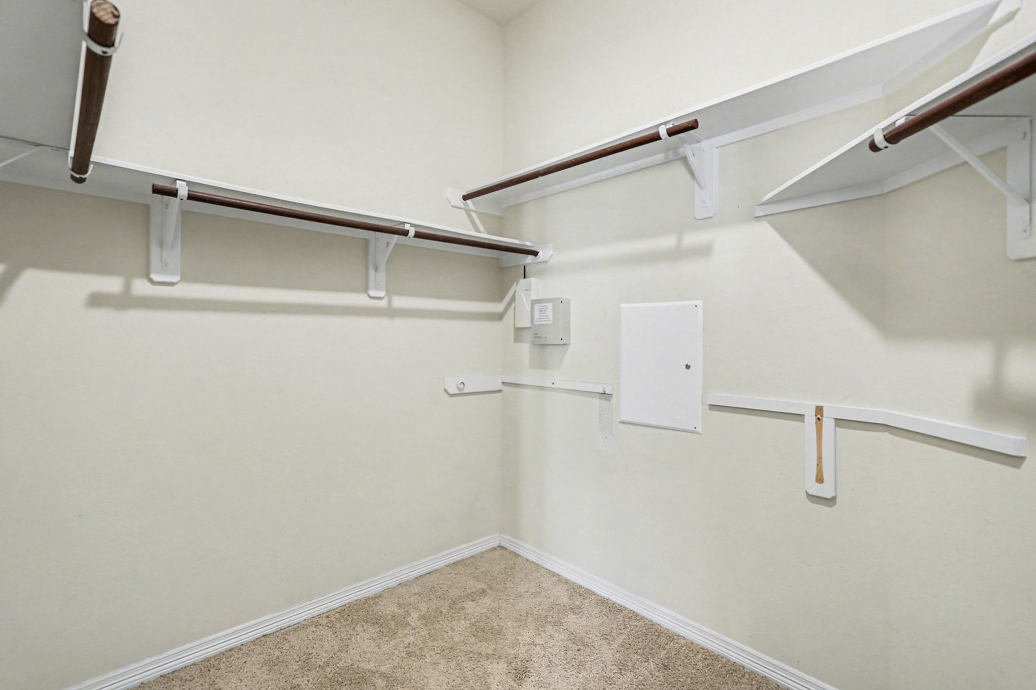 27006 Cliff Pointe Lane Katy, TX 77494 - Photo 21 of 34 Large walk-in closet with built-in shelving and hanging space—designed for easy organization and storage.