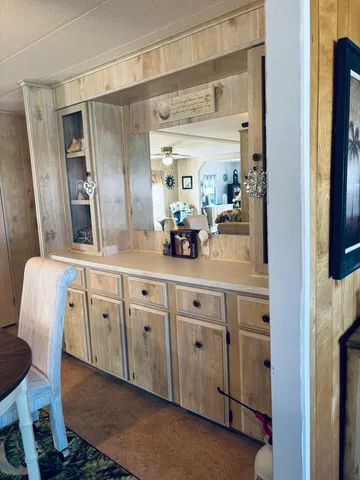 a spacious bathroom with a double vanity sink and a mirror