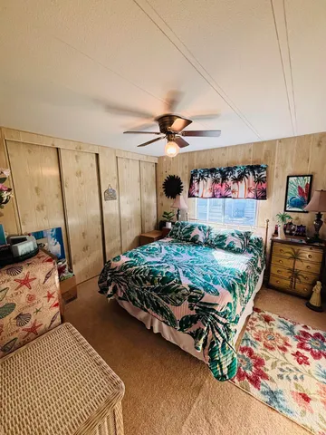 a bathroom with a double vanity sink mirror and toilet