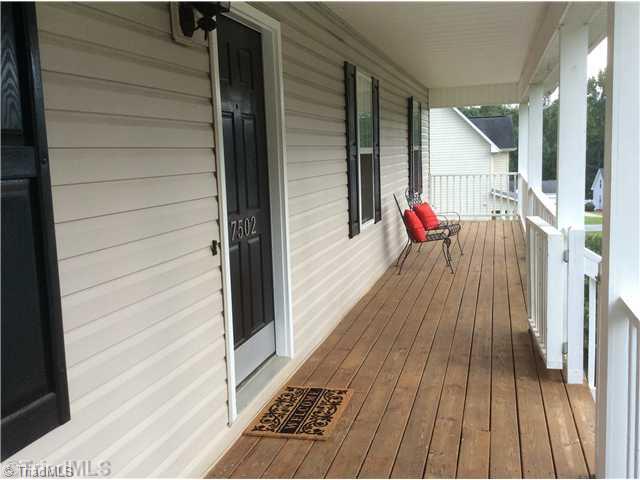 7502 Keating Drive Oak Ridge, NC 27310 - Photo 2 of 16 Other. Relaxing sitting area on the expansive front porch; perfect for your morning coffee!