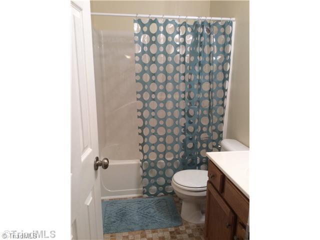 7502 Keating Drive Oak Ridge, NC 27310 - Photo 11 of 16 Bath. Hall bathroom.