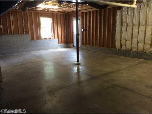7502 Keating Drive Oak Ridge, NC 27310 - Photo 16 of 16 Other. The walk out basement is bright and light and has higher ceiling space! Great storage or hobby space. Or with just a little finishing work would provide a wonderful living space!