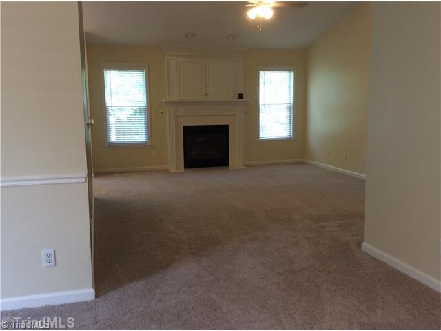 7502 Keating Drive Oak Ridge, NC 27310 - Photo 3 of 16 Den/Family/Great Room. High ceilings, light and bright!