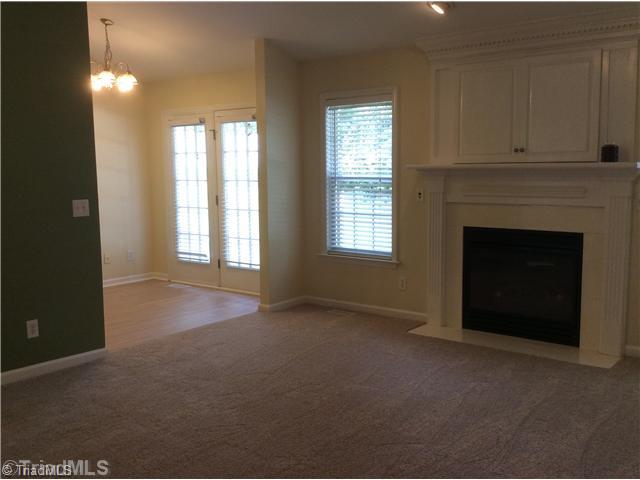 7502 Keating Drive Oak Ridge, NC 27310 - Photo 9 of 16 Den/Family/Great Room. Family room and eat in breakfast area.