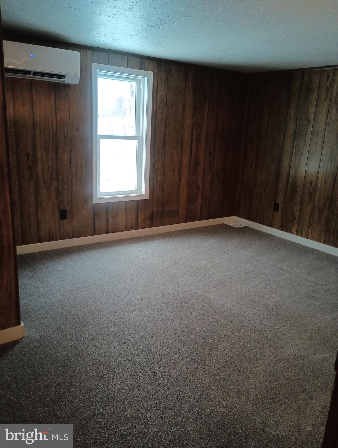 356 Keneagy Hill Road, Unit 27 Ronks, PA 17572 - Photo 5 of 10 an empty room with windows