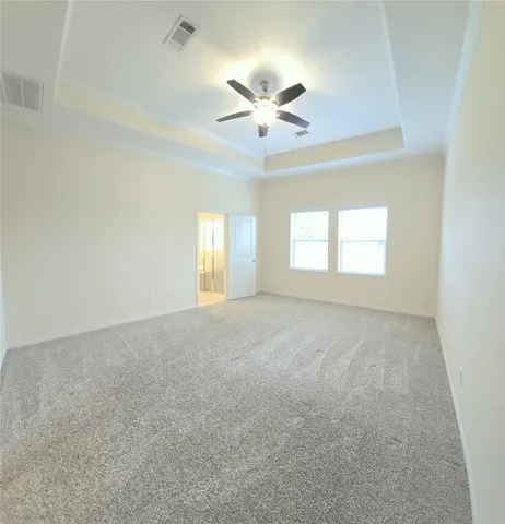 a view of an empty room and window